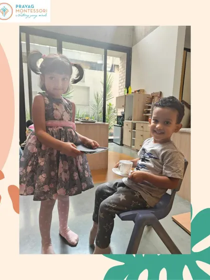 Grace and Courtesy are taught as practical life skills. Here, a child learns to serve a guest, a simple act that teaches empathy, respect, and social awareness.