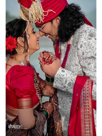 In this moment, our smiles say it all. A close-up shot capturing the pure love and joy between this beautiful Marathi couple.