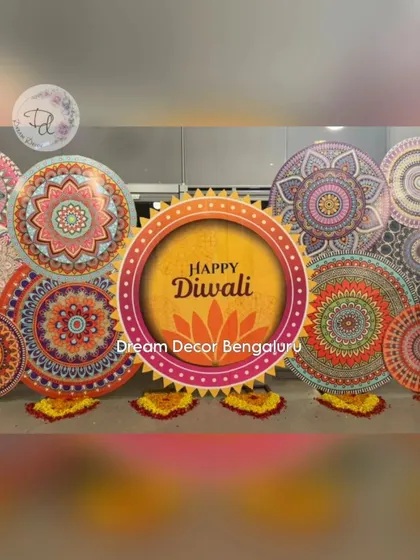 Dazzling Diwali decor for a corporate office. This backdrop was created using printed mandala circles and marigold petals, bringing the festive spirit of Diwali to the workplace.