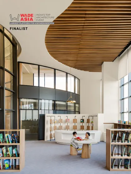 The library at Vedanya School, Gurugram, a project recognized as a finalist at the WADE ASIA awards. The design features curved balconies, abundant natural light, and child-friendly furniture to create an engaging environment for young learners.