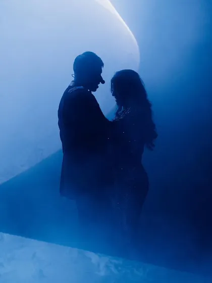 This silhouette shot captures the pure romance of a couple's dance. I use stage lighting and effects to create these beautiful, picture-perfect moments that you will treasure.
