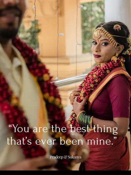 A beautiful over-the-shoulder shot of the bride looking at her groom during the ceremony.