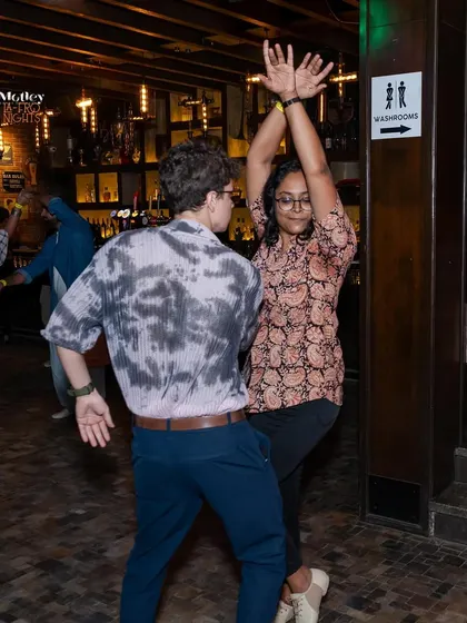 A moment of expressive styling on the dance floor. Our socials are a judgment-free zone where you can let loose and dance your heart out.