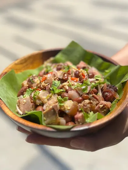 A new addition to our menu, this Smoked Pork and Kholar Beans Salad is a refreshing and flavorful dish. The savory smoked pork is tossed with fresh, nutty Kholar beans, onions, and herbs.