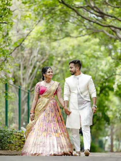A romantic shot showcasing the full look of our custom-designed Bhale Shastra outfits.