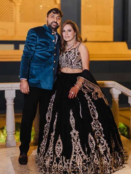 The couple, looking sharp and stylish. Her makeup is designed to last all night through dancing and celebrations.