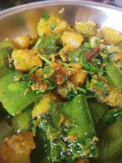 Sheem Kumro Pishpash is a dish I love making with winter vegetables. Snake beans and pumpkin are cooked with coriander and a hint of mustard paste, and it tastes divine with warm rice.