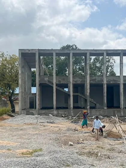 The Weaver's Center is designed as a series of interconnected blocks, creating courtyards and shaded walkways. This approach helps to break down the scale of the building and fosters a sense of community and interaction.