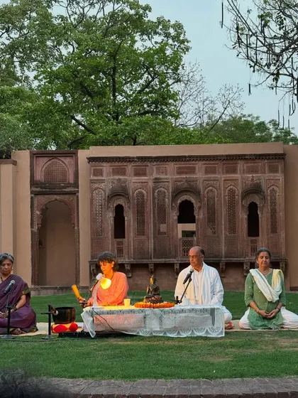 The same meditation session in the daylight, showing the beautiful, traditional backdrop. Creating a sacred space is essential for deep practice.