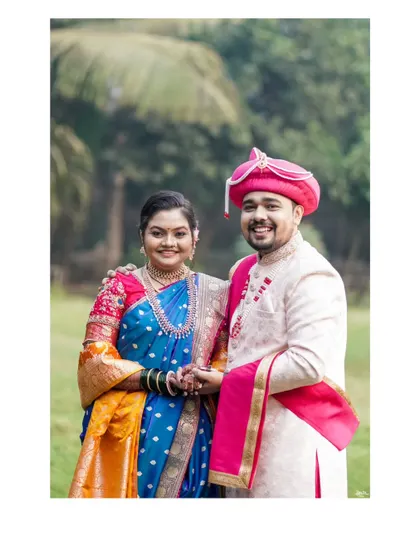A classic, happy portrait of the couple, ready to begin their life together.
