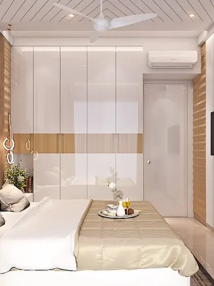This is the same bedroom as my featured one, seen from a different angle. You can see how the textured wall panel opposite the bed complements the chevron headboard and integrates the TV seamlessly.
