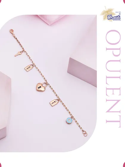A story of connection, told in rose gold. Our Lock & Key charm bracelet is a delicate and meaningful piece, designed to be a personal talisman that you carry with you always.