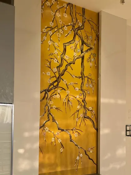 A full view of the completed yellow textured art panel.