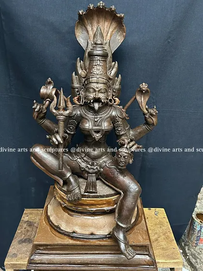 A wax model of the fierce goddess Pratyangira. This complex form, with a lion's face and a human body, is a powerful protector, and her energy is first captured in this initial wax sculpture.