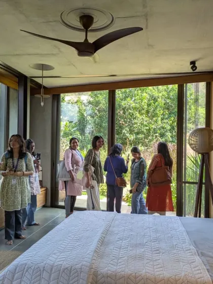 Students exploring one of the bedrooms at Villa Soham, observing how the large windows frame the landscape. We discussed how architecture can connect inhabitants with nature, the importance of natural ventilation, and the subtle details that create a sense of tranquility.