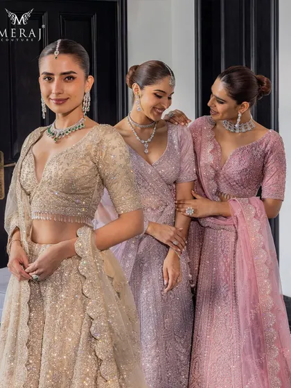 A candid moment showcasing the bride and her tribe in my 'Ruvaah' collection, featuring pastel and gold lehengas with crystal detailing.