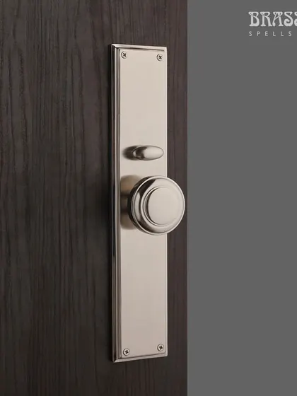 The interior side of the Emperor Entrance Set, featuring a simple, elegant knob in a matching Brush Nickel finish. This ensures a consistent and refined look from every angle.