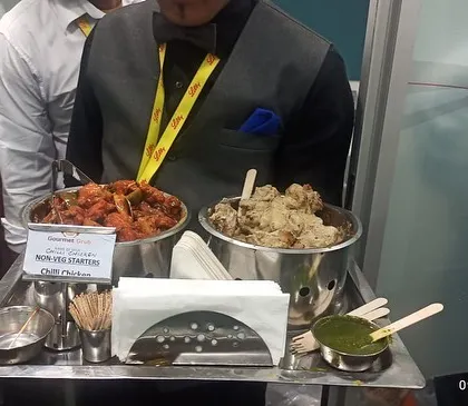 A tray showcasing our non-veg starters, including spicy Chilli Chicken and creamy Malai Chicken.