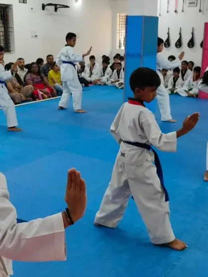 A student practices her form.