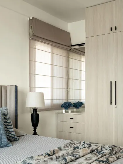 For Project Dolce, this bedroom features light wood-finish wardrobes and a matching dresser, creating a calm and cohesive look. The design maximizes storage while maintaining a light and airy feel.