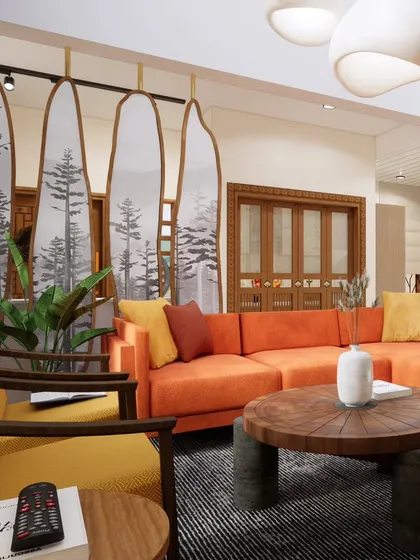 This living room at Campan Valley Villa uses a vibrant orange sectional and nature-inspired partitions to create a lively and welcoming space for family and guests.