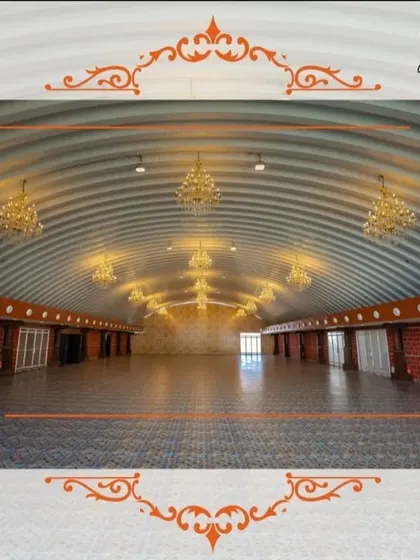 The arched ceiling and elegant chandeliers of this spacious hall provide a unique and grand setting for any celebration. This is one of our versatile spaces ready to be transformed for your event.