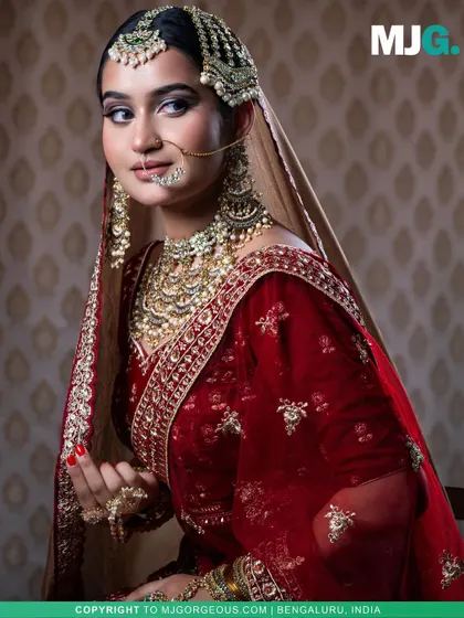 A close-up look at the intricate jewelry and makeup that pairs perfectly with my Heeramandi-inspired bridal lehenga. This shows how you can style the outfit for a complete, royal bridal look.
