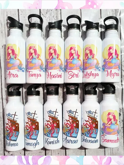 Another look at the personalized mermaid and pirate-themed water bottles, showing the sipper cap option which is great for younger kids.