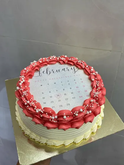 A pretty-in-pink version of my burn away cake, featuring a Valentine's calendar design. The red and white buttercream frosting makes it a beautiful centerpiece for your celebration.