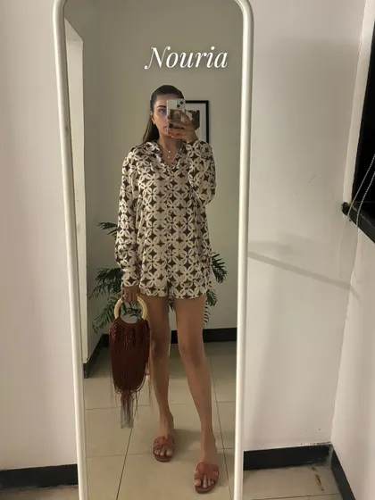 A mirror selfie of a printed long-sleeve co-ord set. The pattern is fun and the silhouette is super comfortable for a casual day out.