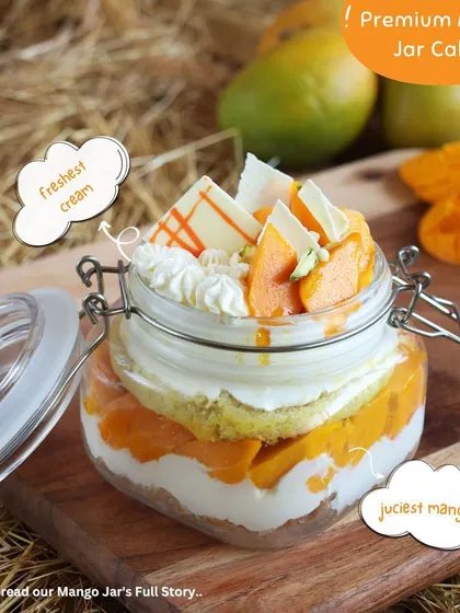 A closer look at our premium Mango Jar Cake. We layer the freshest cream, soft sponge, and juiciest mangoes to create a dessert that's out of this world.