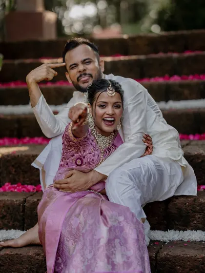 A playful and romantic moment on the steps of The Peacock Grove. We encourage our couples to be themselves, which allows us to capture their unique personalities and connection.