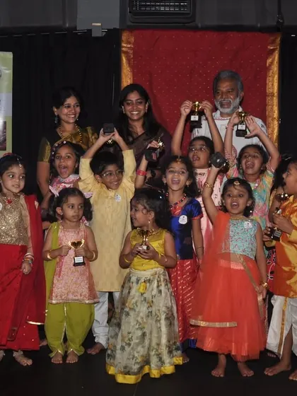 Our little champions holding their trophies at our anniversary celebration. We love to recognize and encourage the progress of every child.
