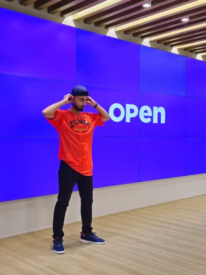 Getting ready to bring the energy at Open Financial. The vibrant backdrop matches the vibe we aim to create in every corporate session.