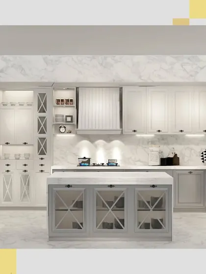 The central island acts as the heart of this kitchen, providing extra workspace and storage with its glass-fronted cabinets.