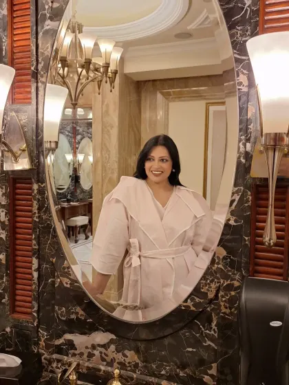 Another mirror selfie in the blush pink co-ord set, showing its elegant structure.