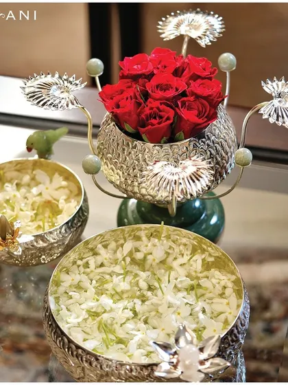 Embrace the festive spirit with my handcrafted silver urlis. Filled with water and floating flowers, these traditional bowls become a centerpiece of tranquility and elegance for your celebrations.