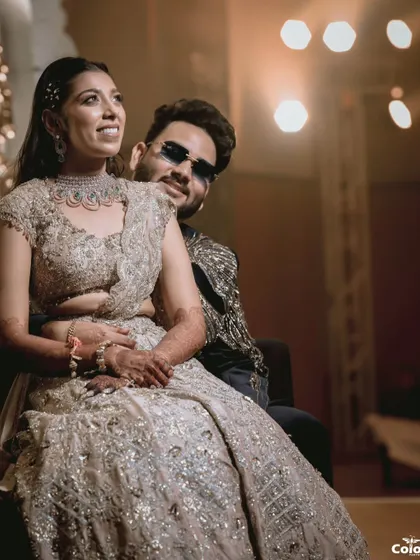 A stylish shot of the couple looking away, with dramatic backlighting that creates a cinematic feel.