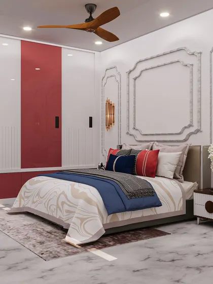 Another view of the European-style bedroom, highlighting the contrast between the classic white walls and the modern red wardrobe.