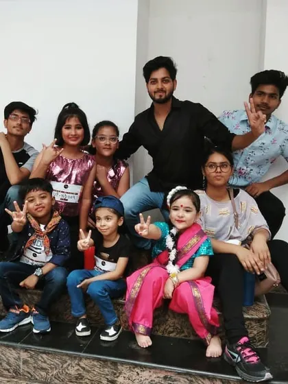 Another group photo with my performers backstage. From the youngest to the oldest, everyone supports each other before hitting the stage.