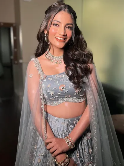 A beautiful portrait of Aayushi. Her skin is glowing and the makeup is soft and pretty, perfect for an engagement party.