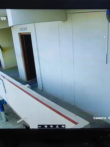 A view of a school corridor, monitoring the entrance to classrooms.