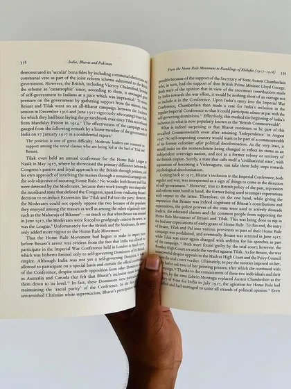 An open copy of 'India, Bharat and Pakistan'. The text provides a detailed, evidence-based analysis of the historical events and ideological currents that have shaped the subcontinent.