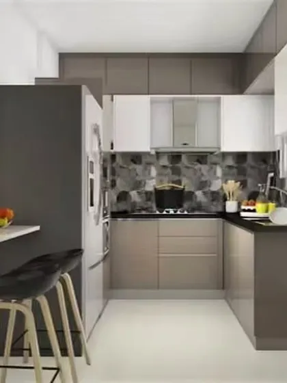 A compact U-shaped kitchen with a breakfast bar, perfect for small apartments. The design uses a neutral color palette of grey and white, with an open pass-through to the dining area.