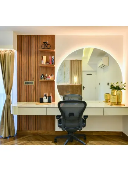 This versatile home workstation doubles as a chic dressing table. The design merges functionality and elegance, with a large backlit mirror, ample desk space, and integrated shelving for a seamless transition from work to pampering.