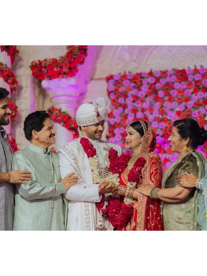 A family portrait with the happy couple, a must-have shot for any wedding.