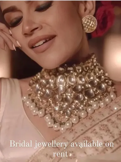A close-up of a Kiara Advani-inspired choker, featuring large uncut Polki stones and pearl drops. This is a very popular rental piece for receptions and sangeets.