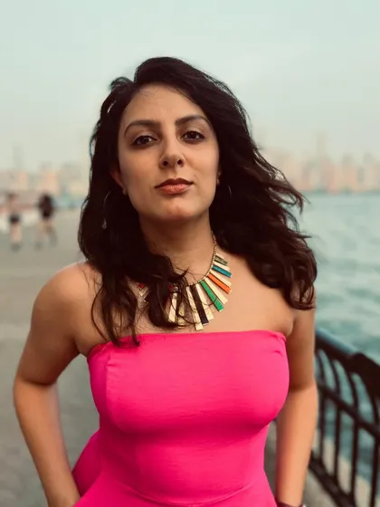A duplicate image capturing a moment of confidence by the water.