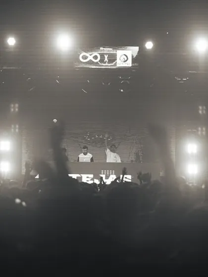 A black and white photo of the crowd and stage at IIT Patna, creating a timeless concert feel.