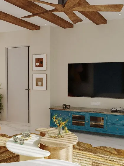 The other side of the colorful living room, showing the TV unit and how the different elements come together. The design proves that you can embrace bold colors while still creating a cohesive and relaxing home environment.